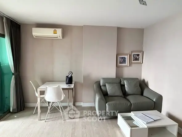 Modern living room with sleek furniture and natural light, perfect for urban living.