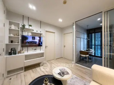 Modern living room with sleek design and open balcony view