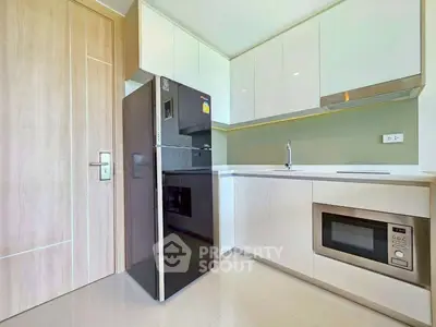 Modern kitchen with sleek appliances and minimalist design