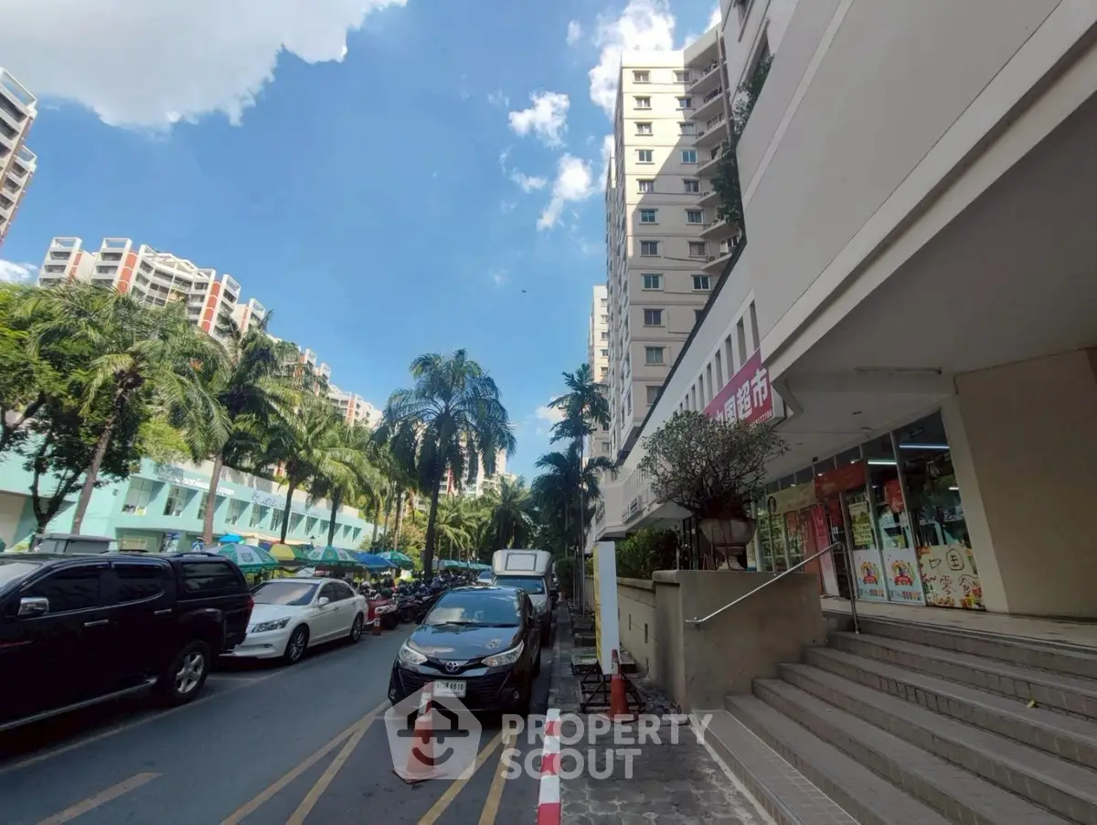 Urban residential area with tall buildings and street view