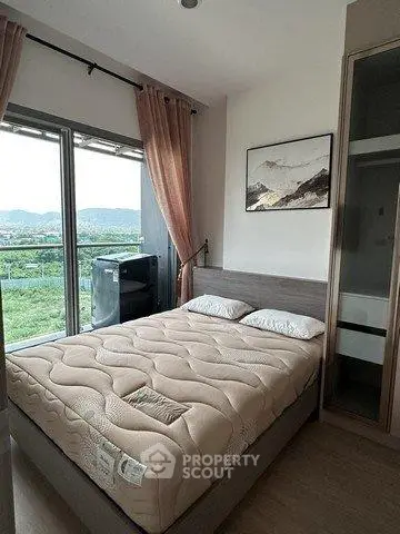 Cozy bedroom with scenic view and modern decor