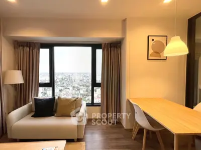 Modern living room with city view, cozy seating, and stylish dining area.