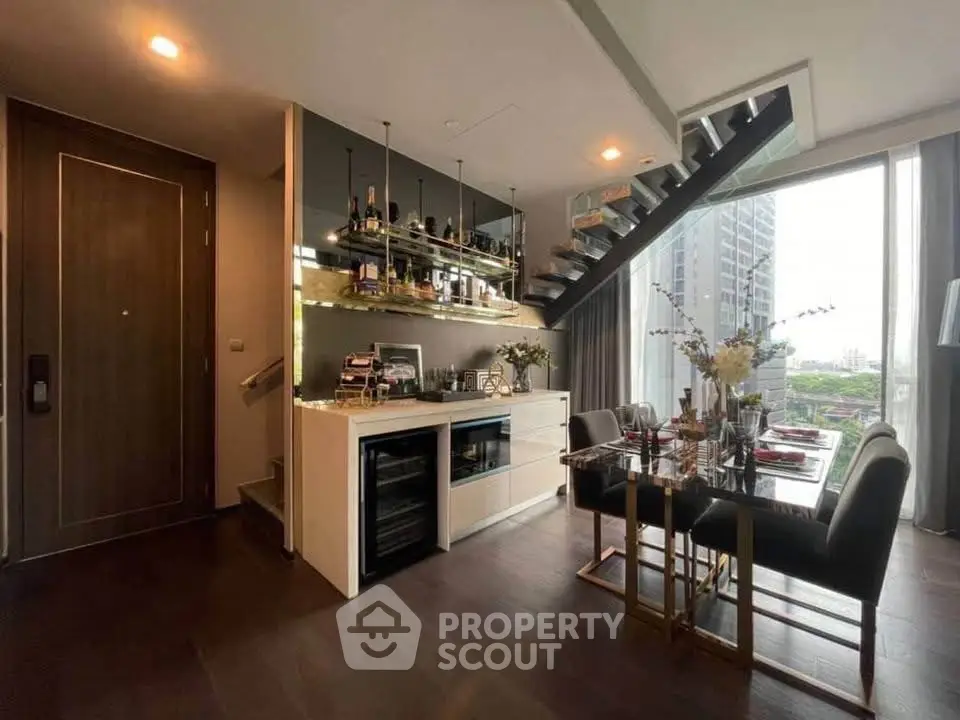 Luxurious modern dining area with staircase and city view, featuring elegant decor and ample natural light.