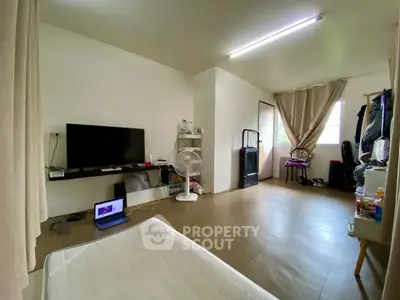 Spacious studio apartment with modern decor and natural light