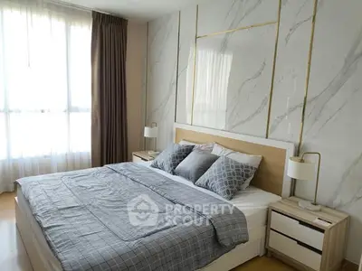 Luxurious bedroom with elegant decor and natural light