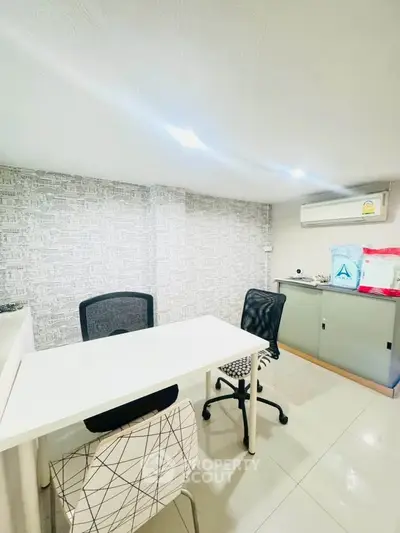 Modern study room with sleek furniture and air conditioning