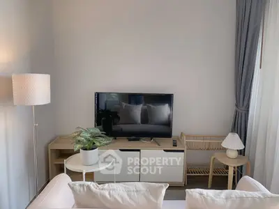 Modern living room with stylish decor and natural light