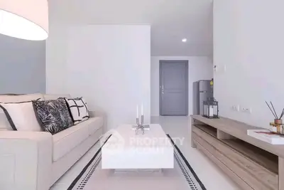 Modern living room with sleek furniture and minimalist decor