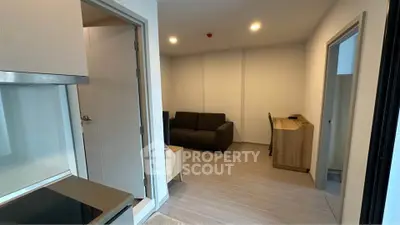 Modern apartment interior with cozy living room and study area