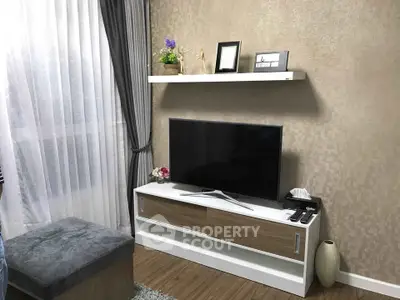 Modern living room with sleek TV stand and elegant decor