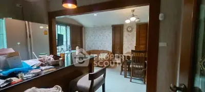 Cozy living room with dining area and modern kitchen setup