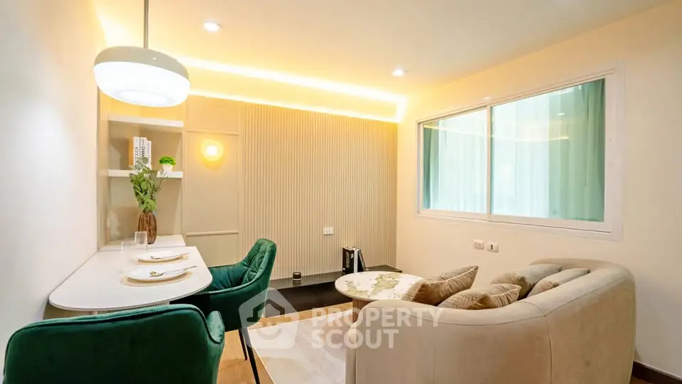 Modern living room with elegant decor and cozy seating area, perfect for relaxation and entertainment.