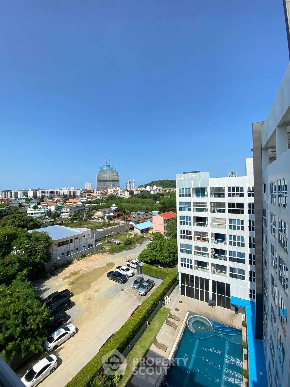 Stunning high-rise building with pool and panoramic city view