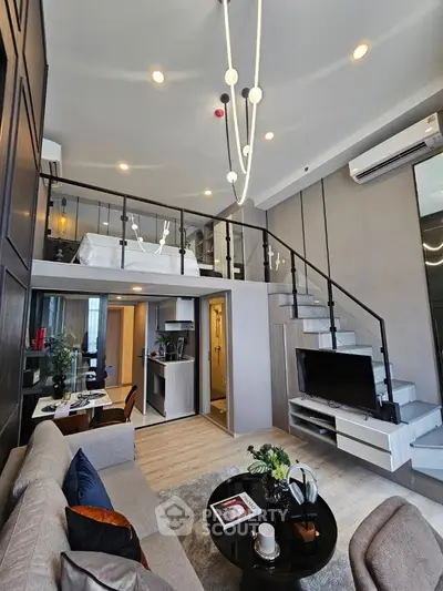 Modern loft apartment with stylish living room and mezzanine bedroom