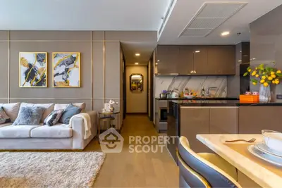 Luxurious modern living room with elegant decor and open kitchen layout, perfect for stylish urban living.