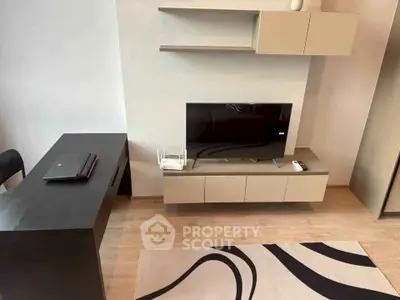 Modern living room with sleek TV unit and stylish desk setup
