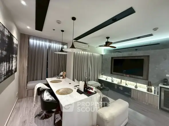 Modern living room with sleek design, featuring a stylish dining area and contemporary decor.