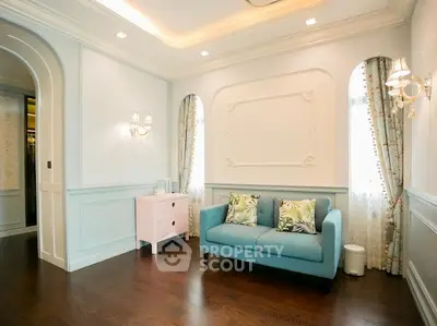Charming living room with elegant decor and cozy seating in a bright, inviting space.