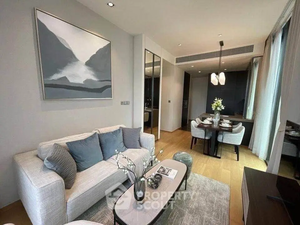 Modern living room with elegant decor and dining area in luxury apartment