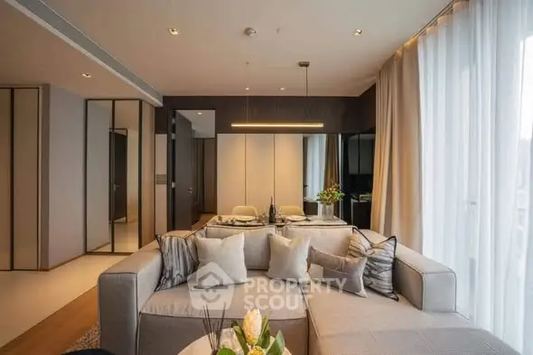 Luxurious modern living room with elegant decor and ample natural light