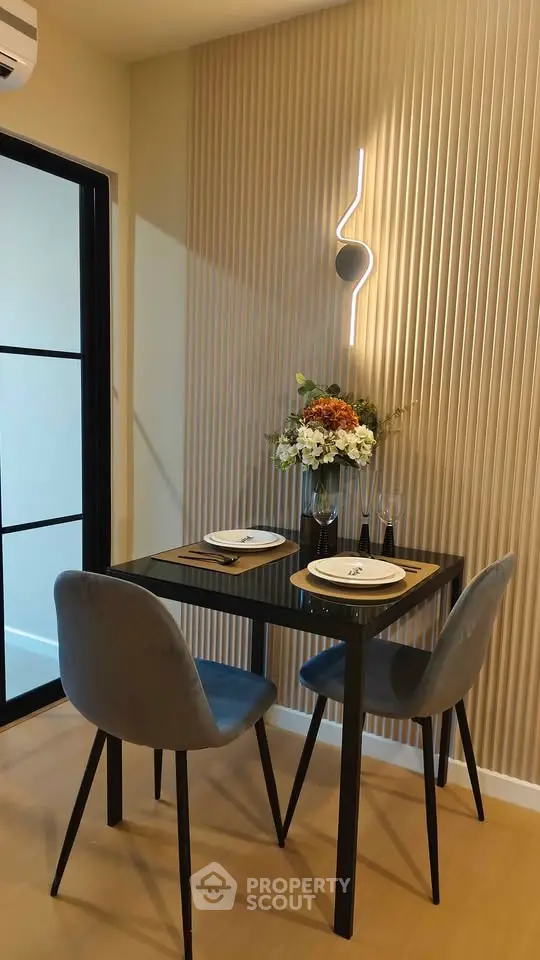 Modern dining area with stylish decor and elegant table setting