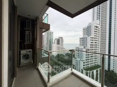 Stunning high-rise balcony with ocean view and modern cityscape, perfect for urban living.