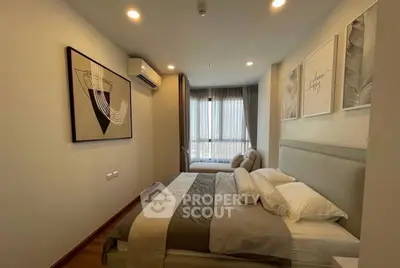 Luxurious bedroom with elegant lighting and plush bedding, perfect for relaxation and comfort.