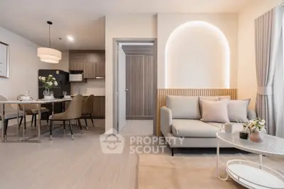 Modern open-plan living room with elegant dining area and stylish decor