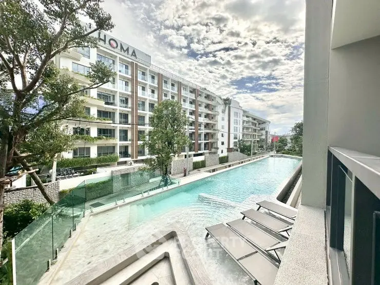 Luxurious apartment complex with stunning pool and modern architecture