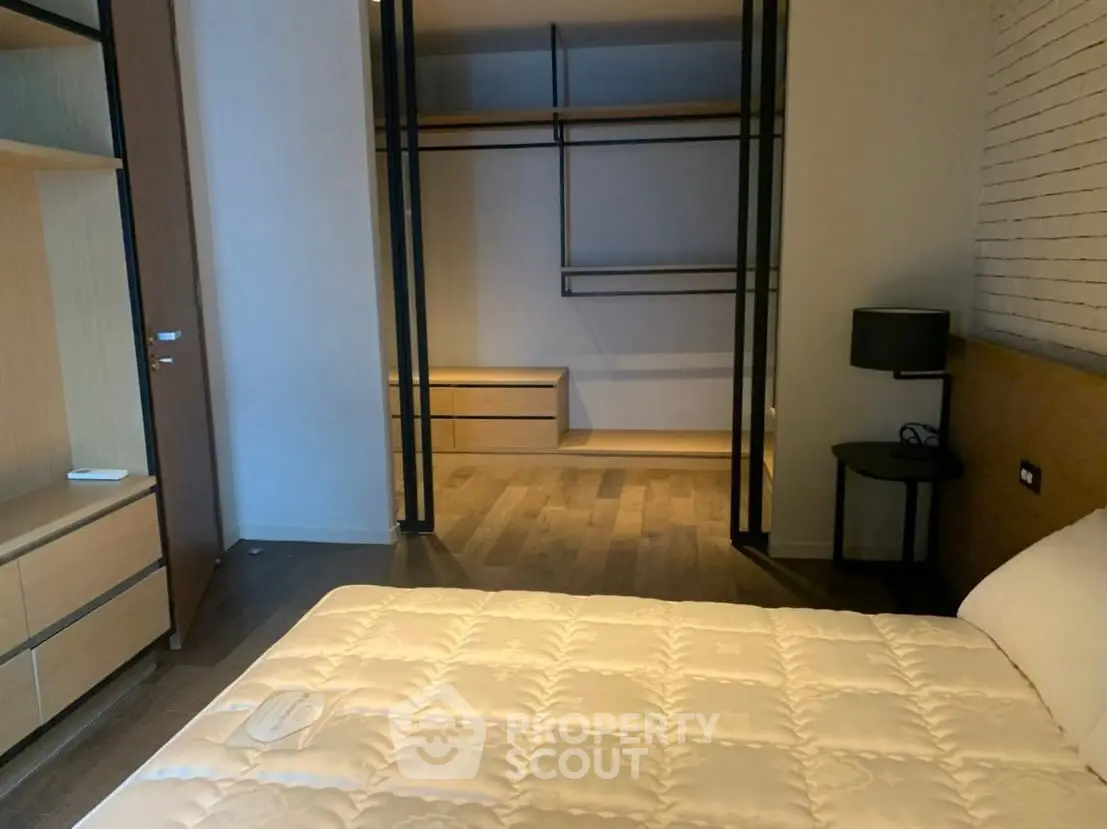 Spacious bedroom with modern design and walk-in closet