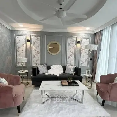 Luxurious living room with elegant decor and plush seating, perfect for relaxation and entertaining.