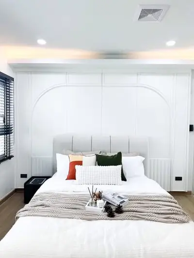 Modern bedroom with stylish decor and cozy ambiance