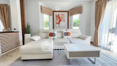 Luxurious modern living room with elegant white sofa and stylish decor