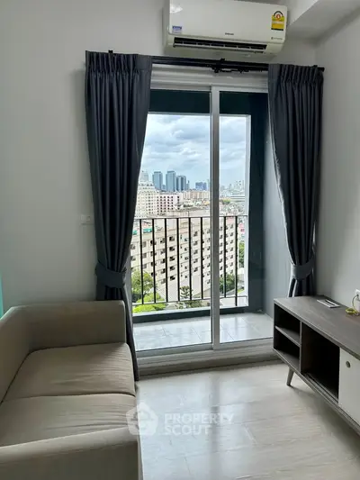 Modern living room with city view from balcony, featuring sleek furniture and air conditioning.