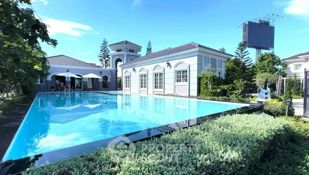 Luxurious property with stunning pool and elegant architecture, perfect for upscale living.