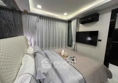 Luxurious modern bedroom with elegant decor and ambient lighting