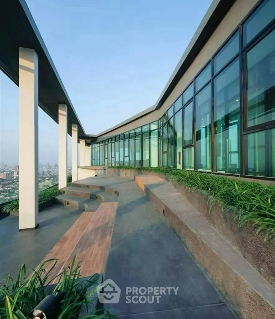 Stunning rooftop terrace with panoramic city views and modern architectural design.