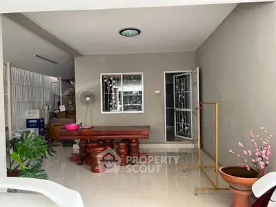 Spacious interior with elegant wooden furniture and modern decor, perfect for stylish living.
