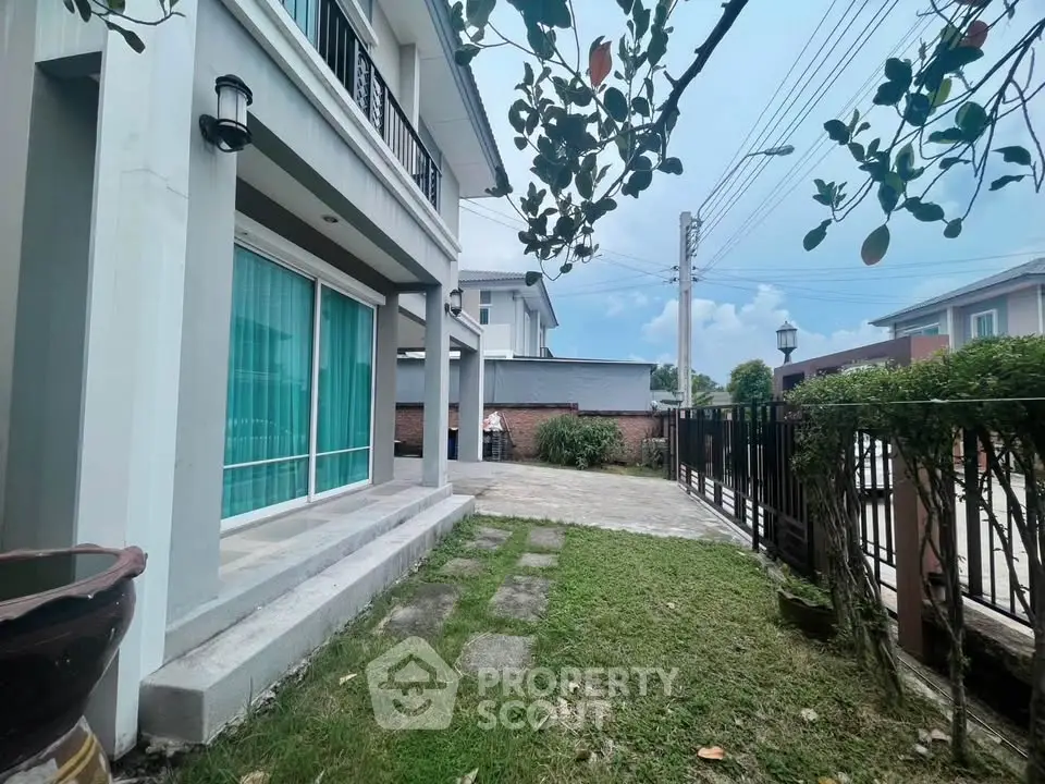 Charming suburban home with spacious garden and modern exterior design.