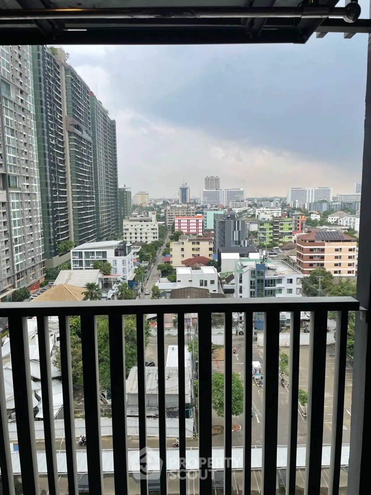 Stunning cityscape view from a high-rise balcony, perfect for urban living enthusiasts.