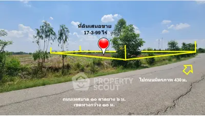 Spacious land plot for sale with clear road access and scenic views.