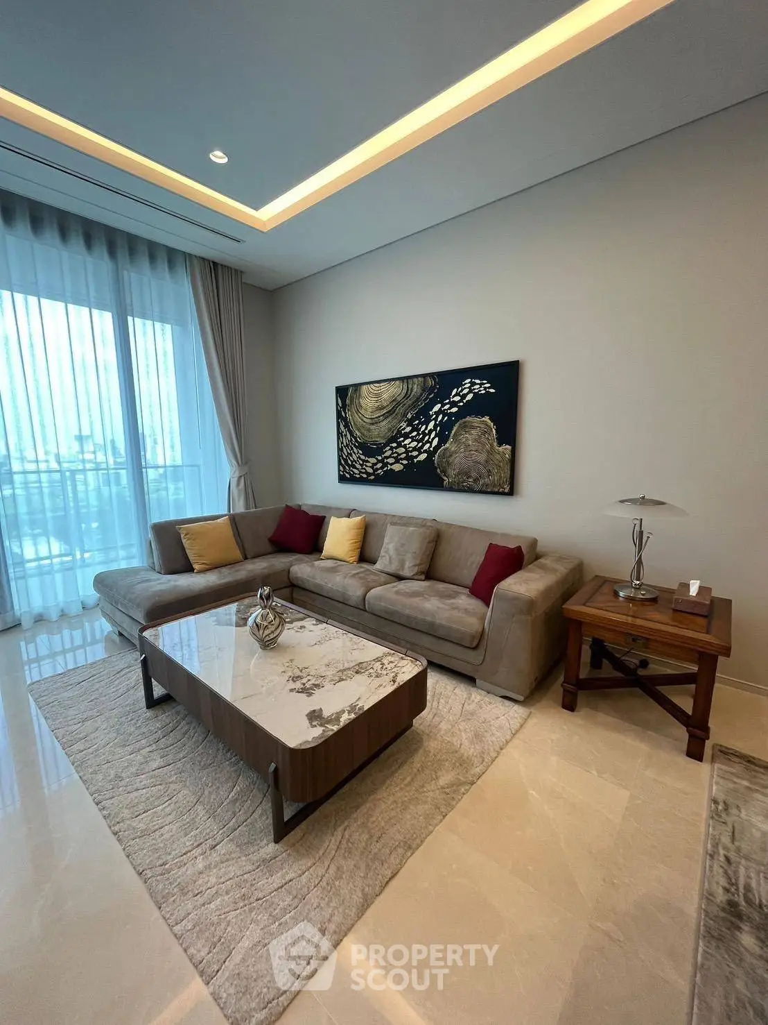Luxurious living room with modern sectional sofa and elegant decor