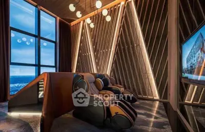 Luxurious home theater with ocean view and modern lighting design