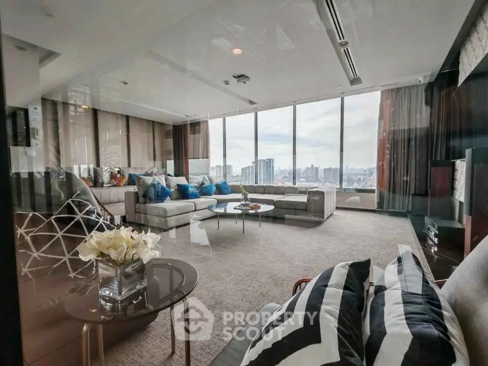 Luxurious living room with panoramic city views and modern decor