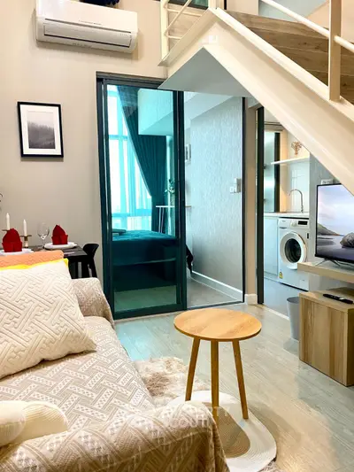 Modern duplex apartment with cozy living area and stylish interior design