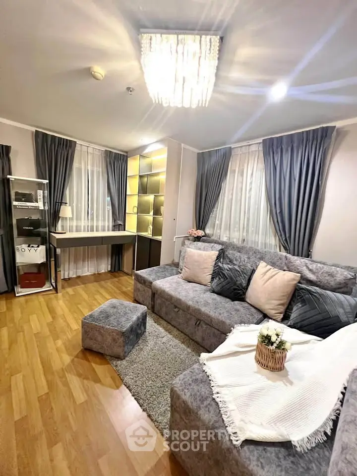 Stylish living room with elegant decor and cozy seating area, perfect for relaxation and entertainment.