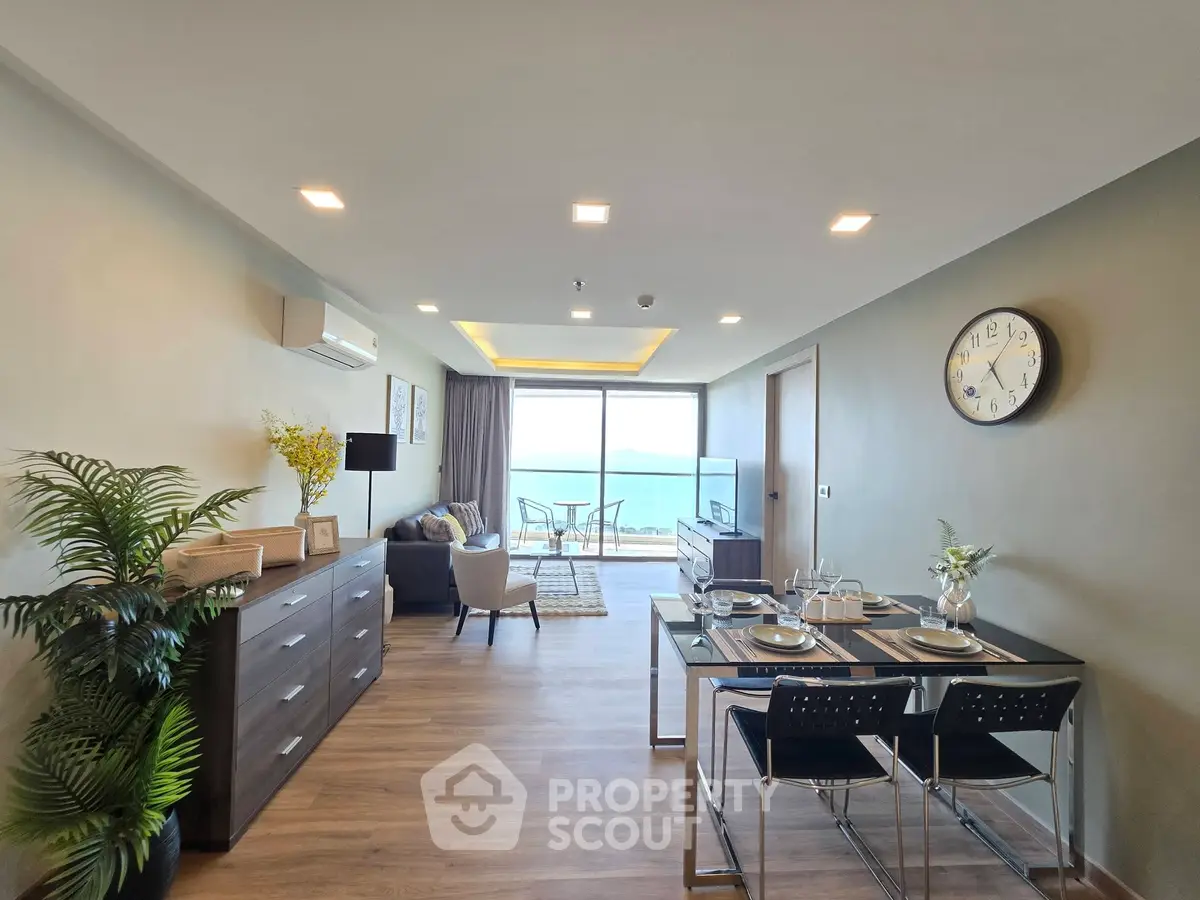 Spacious living room with ocean view and modern decor