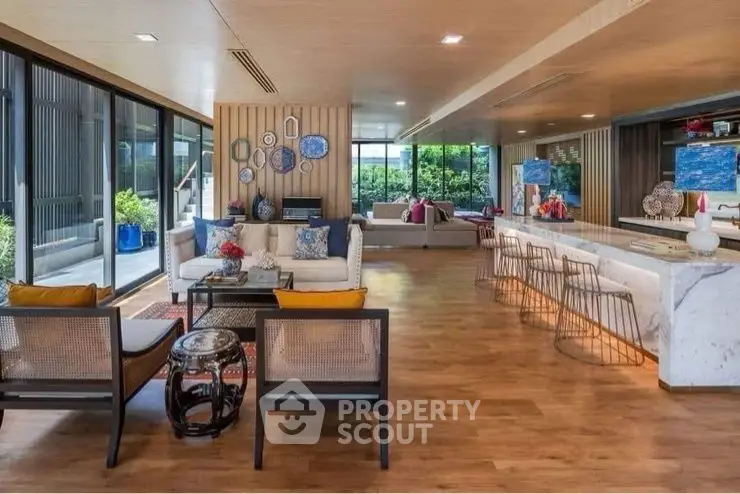 Luxurious open-plan living room with modern decor and spacious seating area