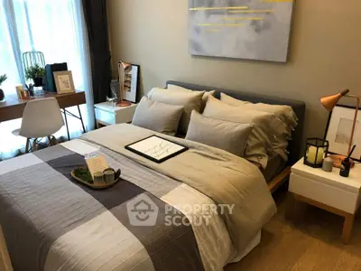 Cozy bedroom with modern decor, featuring a comfortable bed, stylish desk, and soft lighting for a relaxing ambiance.