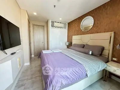 Luxurious bedroom with modern decor and elegant furnishings, featuring a plush bed and stylish wall accents.